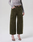 Thassos twisted seam utility pant in dark green corduroy.
