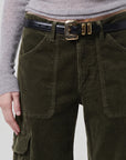 Thassos twisted seam utility pant in dark green corduroy.