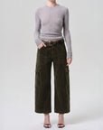 Thassos twisted seam utility pant in dark green corduroy.