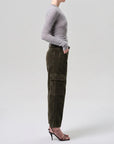 Thassos twisted seam utility pant in dark green corduroy.