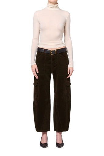 Thassos twisted seam utility pant in dark green corduroy.